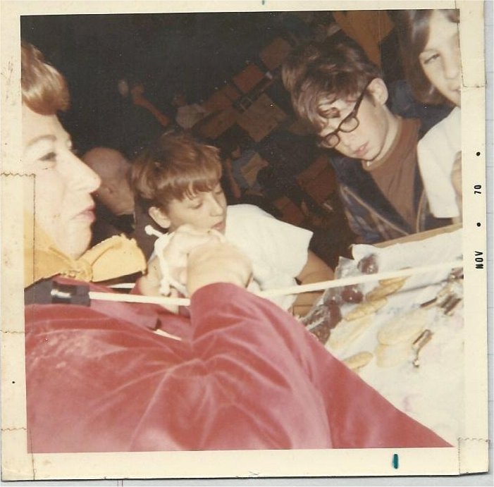 Muriel Gundesheimer, as a Shtettle members, selling candy and cookies during intermission of a performance of The World of Shalom Aleichem
