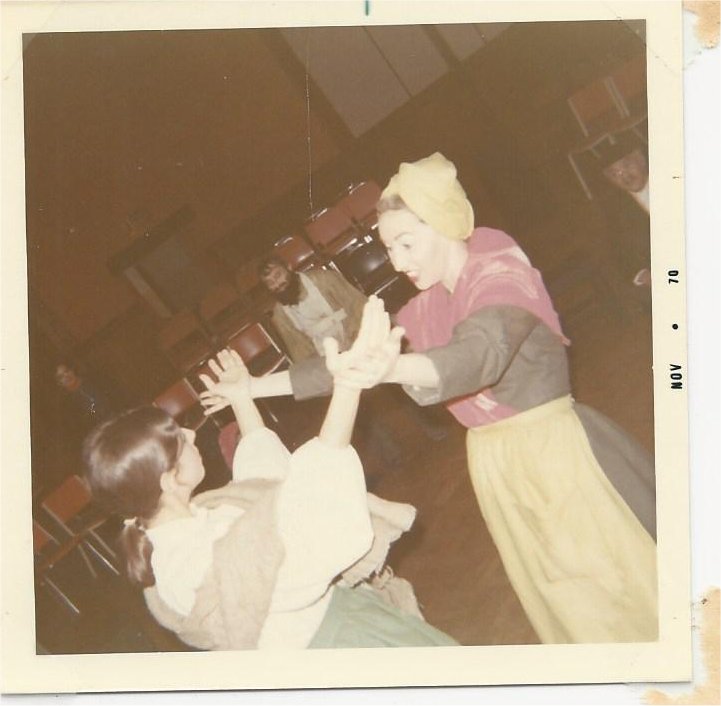 Roz Sonnenstein and Rena Gaynor, as a Schtettle members, act out part of A Tale of Chelm during a dress rehearsal of The World of Shalom Aleichem