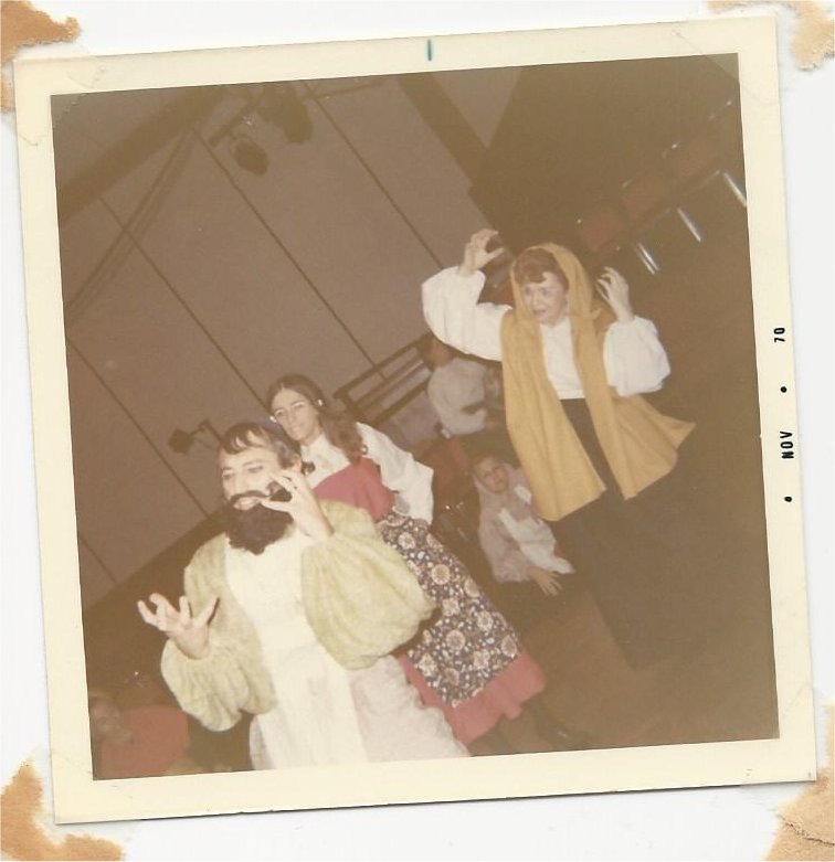 Benton Bloch, Diane Schimmelman and Virginia Hutchens, as Shtettle members heling to tell A Tale of Chelm by "carrying" a tree up the mountain during a rehearsal the World of Shalom Aleichem.