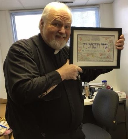 Rev Kevin Thompson with his giclee copy of My Strength and May Song are for the L-rd